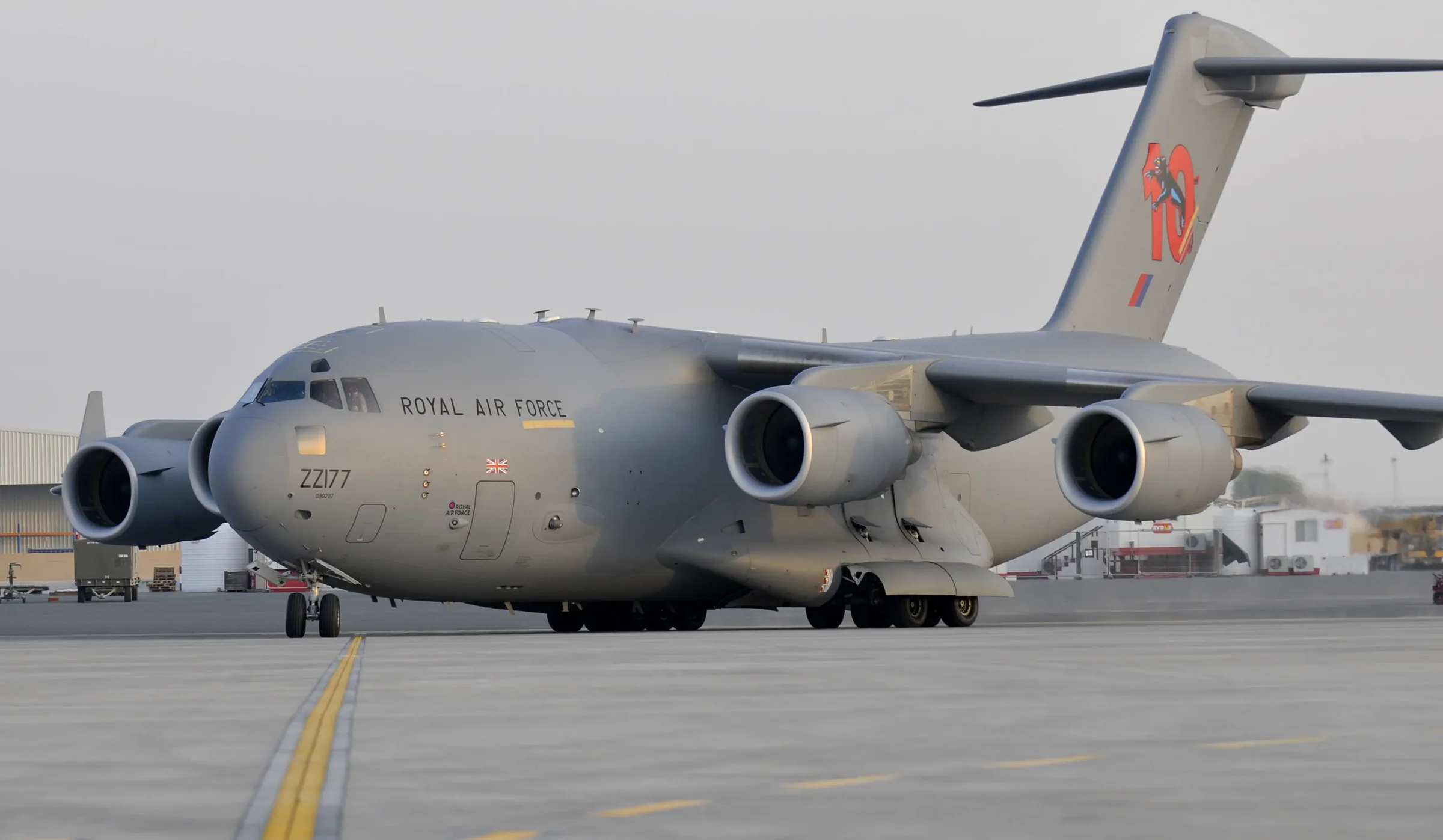 A Royal Air Force C-17 Globemaster transport aircraft at a Middle East airbase on 4 August 2011; archive photograph, not one of the aircraft in the February 2026 reports.